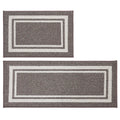 Two brown rectangular rugs with white borders on a white background